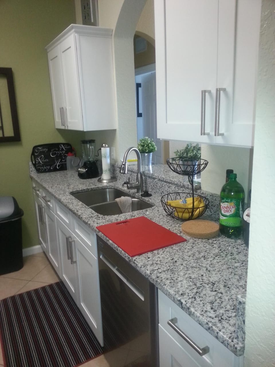 Well stocked kitchen with everything you would need for cooking.
