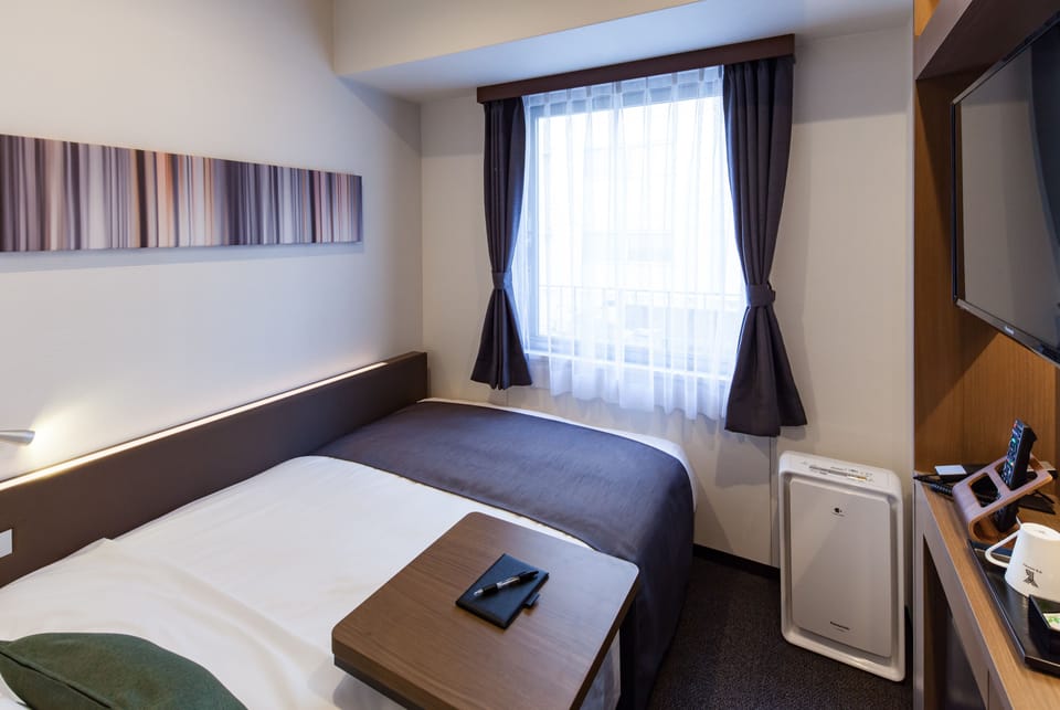 Semi Double Room, Non Smoking | Down comforters, in-room safe, desk, blackout drapes