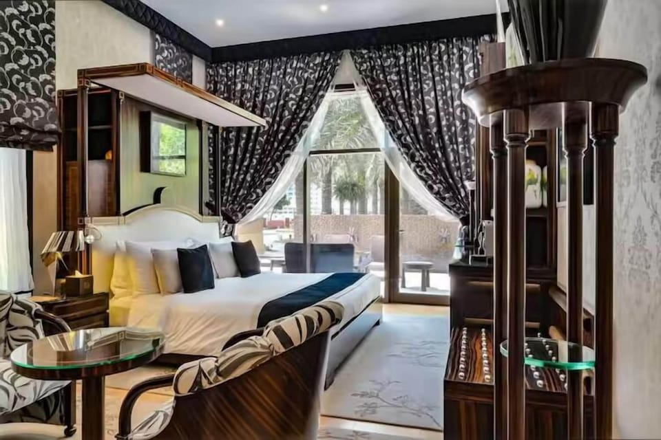 Suite (Four Suites) | Minibar, in-room safe, desk, soundproofing