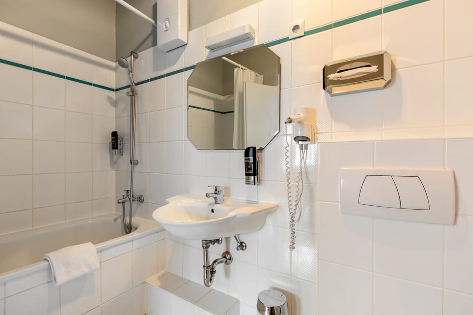 Shower, eco-friendly toiletries, hair dryer, soap
