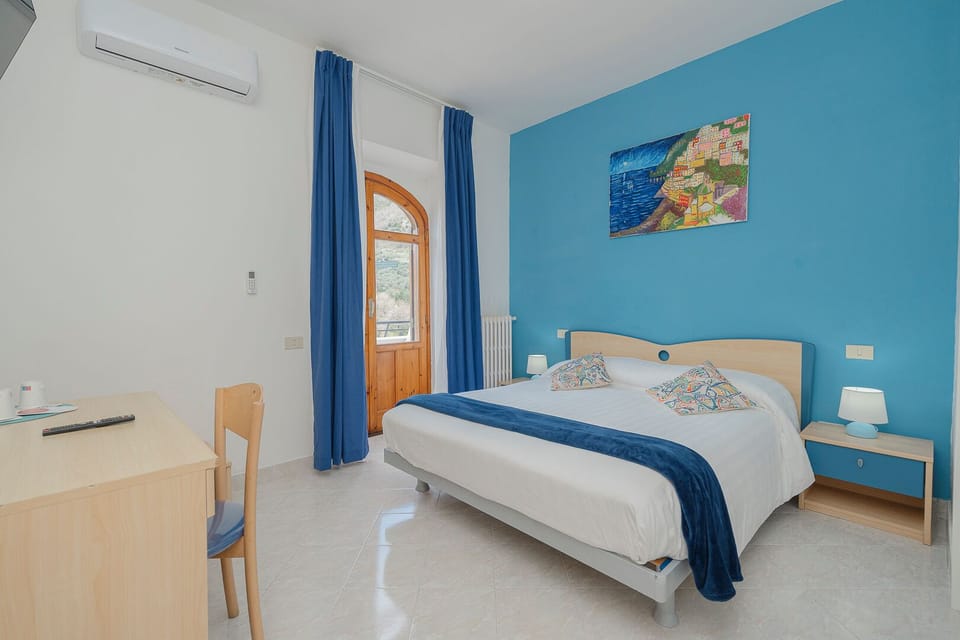 Deluxe Room | Premium bedding, down comforters, minibar, desk