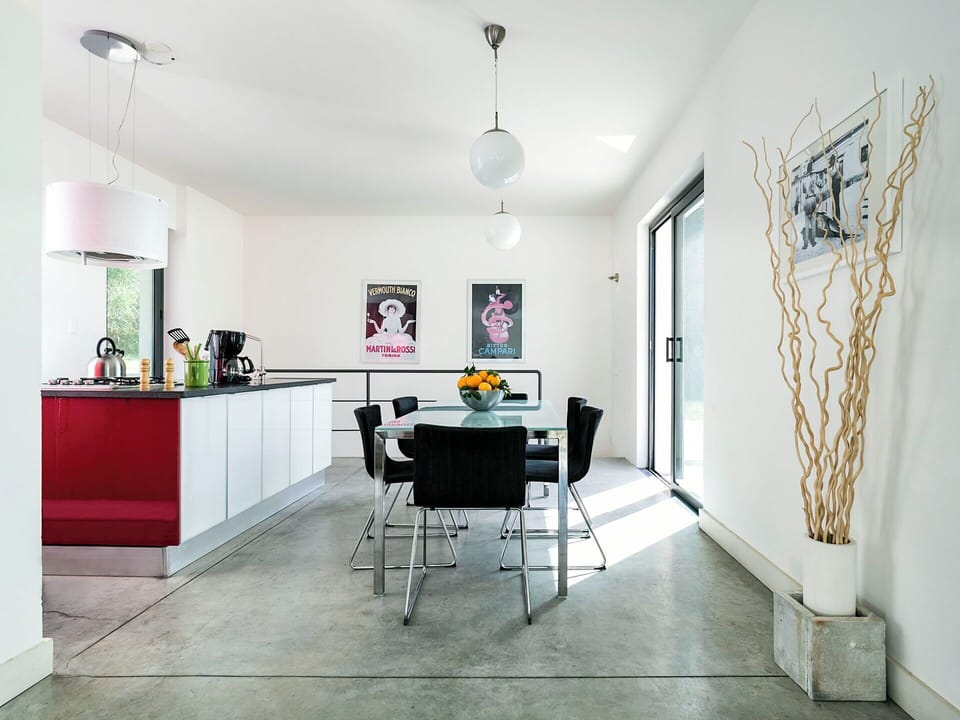 Dining area with open-plan kitchen
