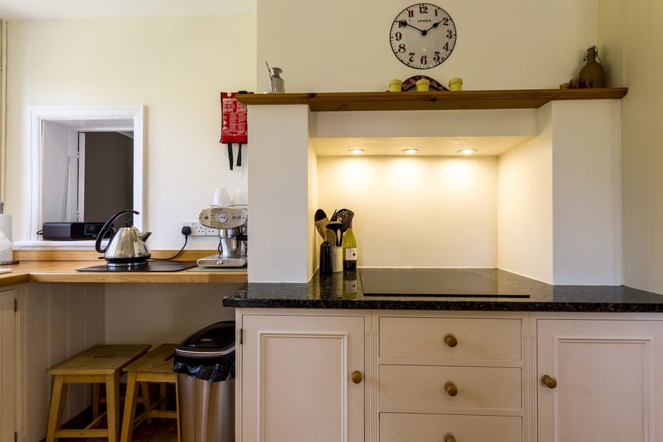 Kitchen with hatch through to the dining room