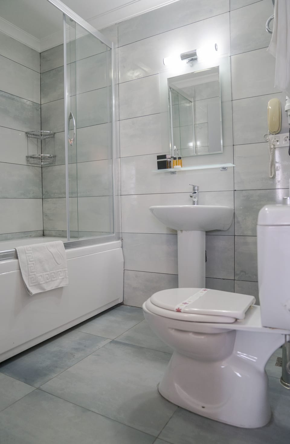 Suite, 1 King Bed | Bathroom | Shower, free toiletries, hair dryer, slippers
