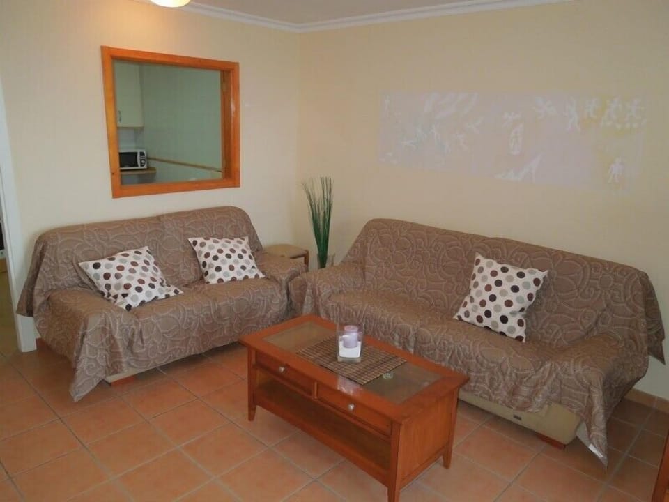 Modern living room with service hatch to kitchen