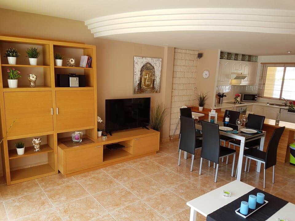 Lounge with dining area and kitchen