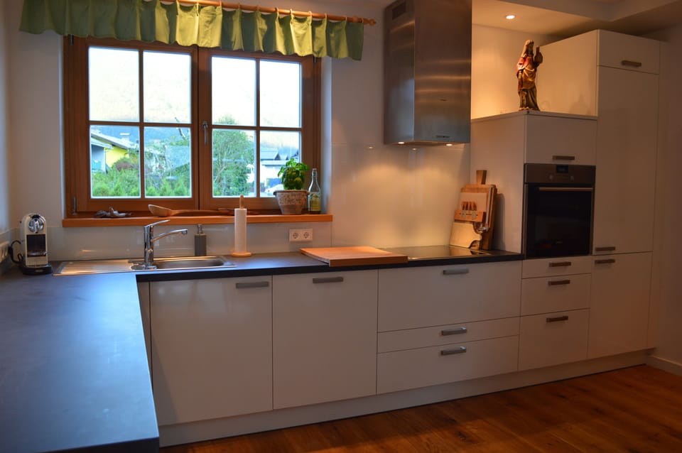 L-shaped kitchenette, with dishwasher, stove, oven, microwave &coffee machine