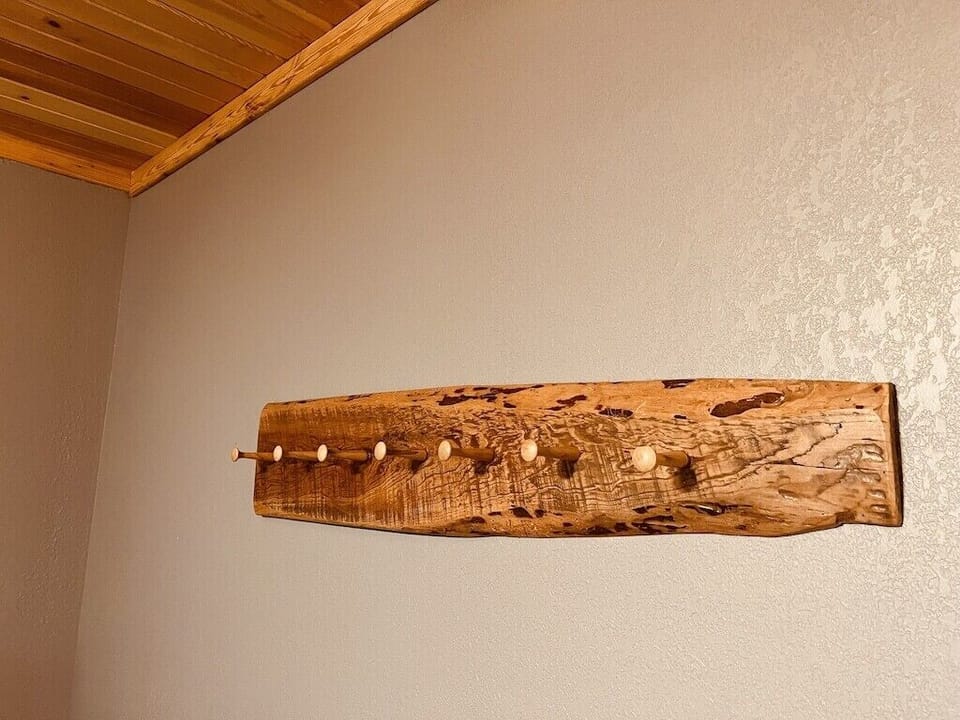 Rustic wood touches throughout the cabin.