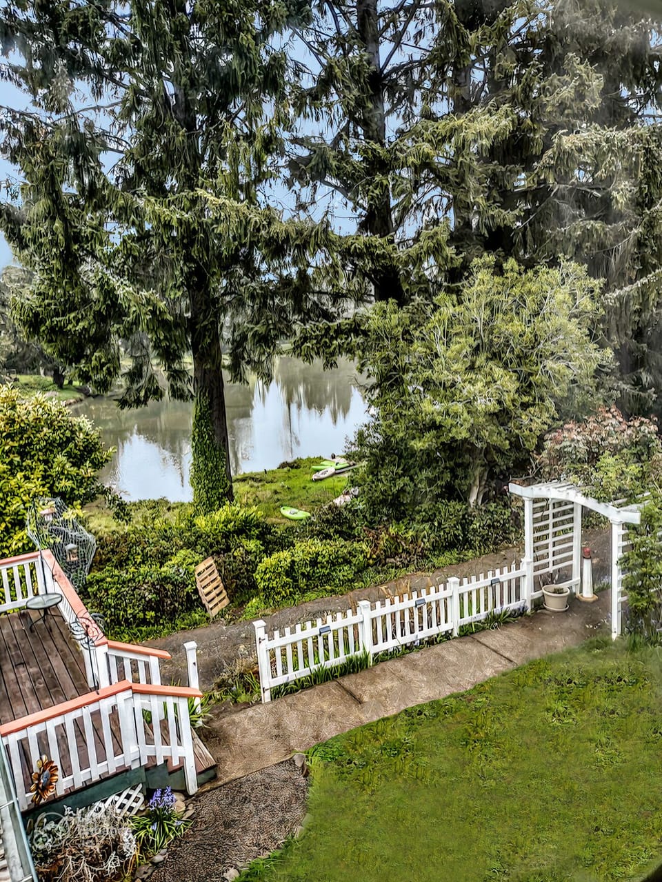 A view from the window of where guests launch kayaks & pedal boat at high tide