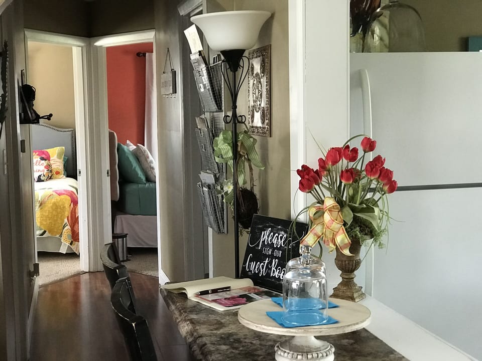 Looking down the hall toward the bathroom & bedrooms.