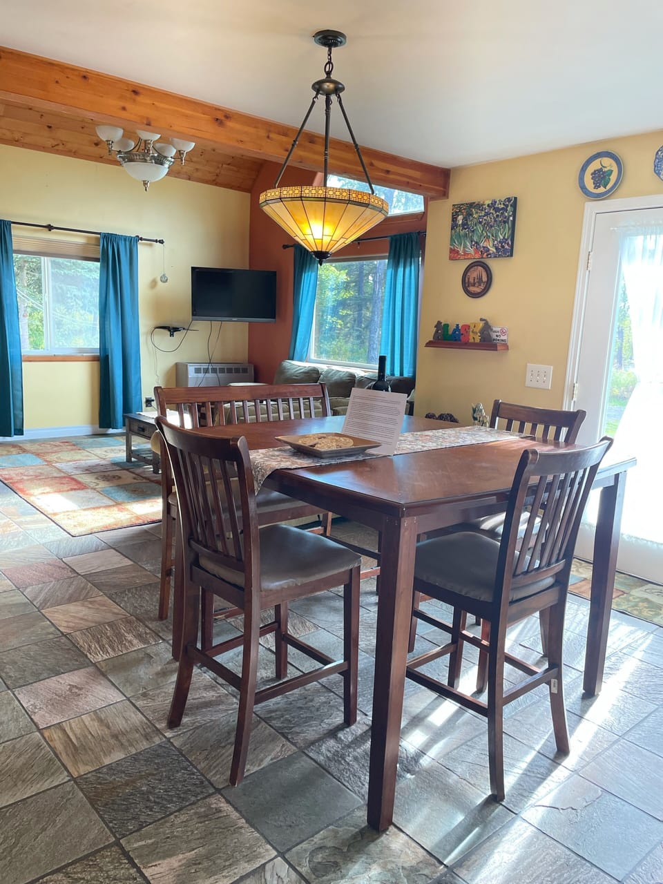 Natural rock floors throughout main floor. 