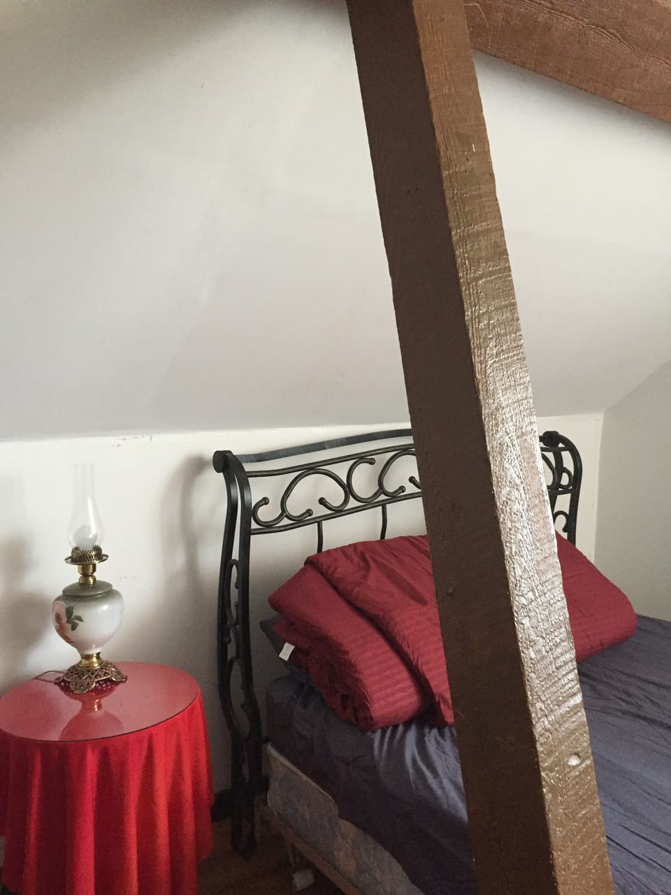 Bedroom 2 with queen bed and again sloping ceiling 