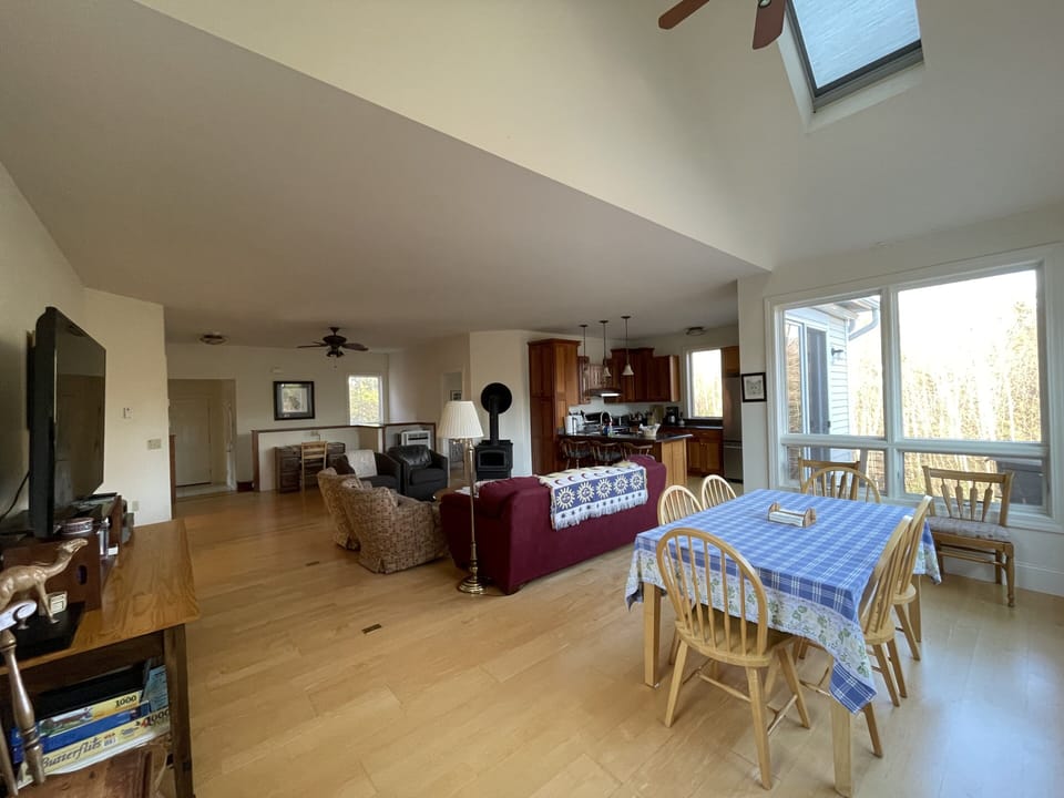 Main living floor with open concept including kitchen and dining space 