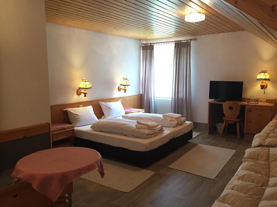 Desk, WiFi (free), bed sheets