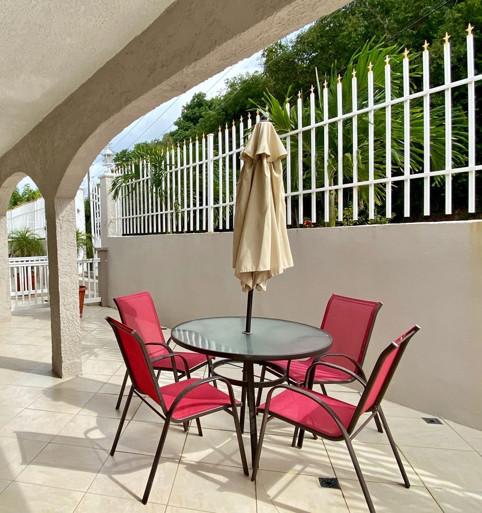 Extended front porch to villa entrance.