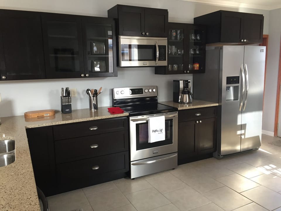 Fully equipped kitchen with brand new stainless appliances and a dishwasher