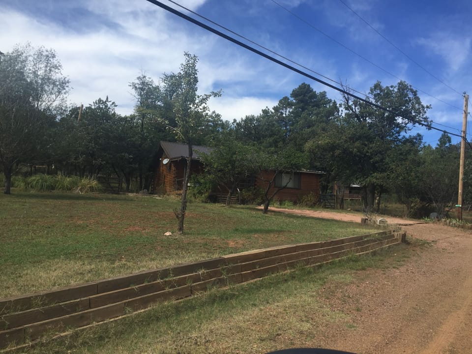 Dead end road leading up to cabin