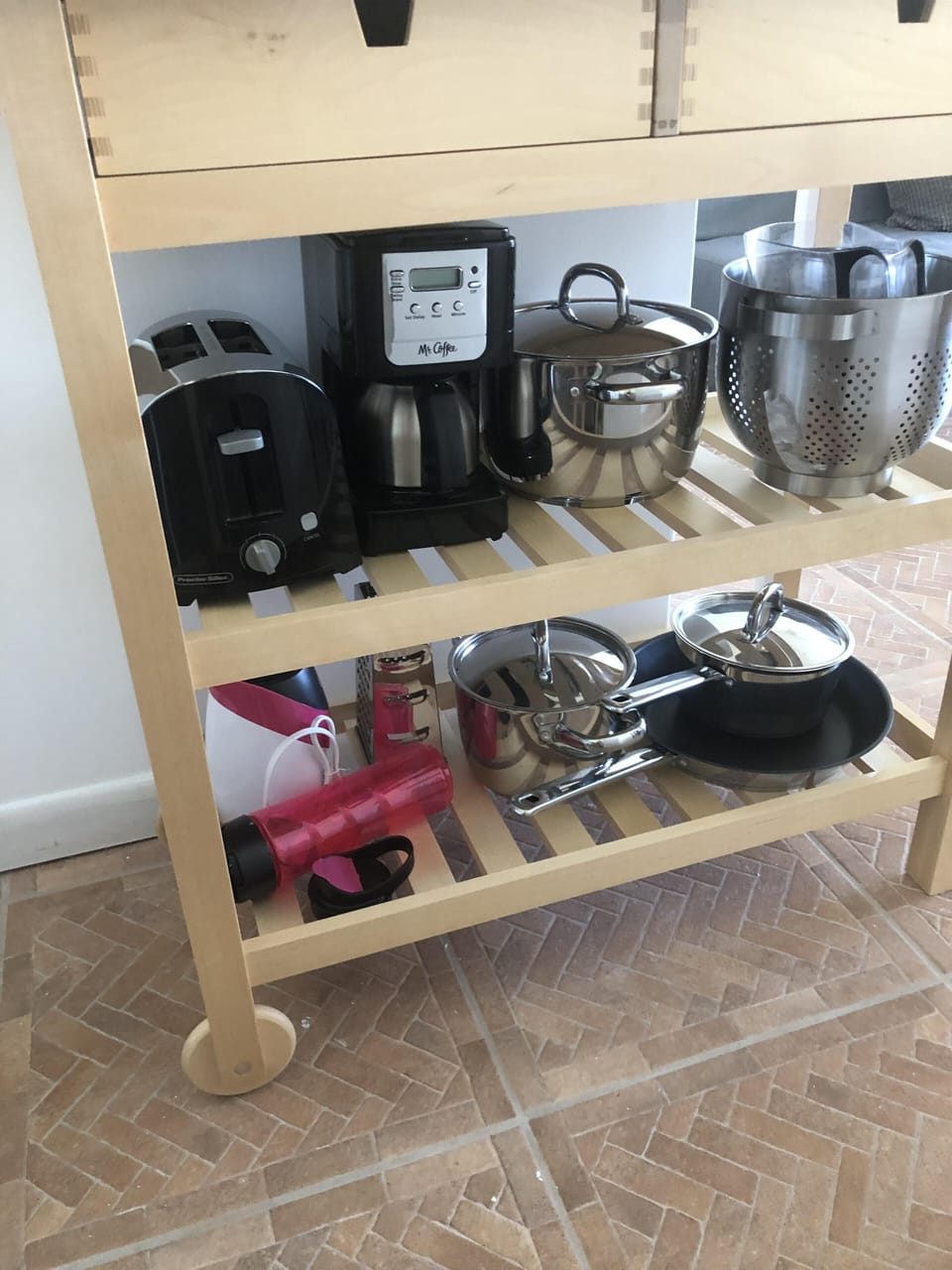 blender, coffee pot, toaster, pots and pans