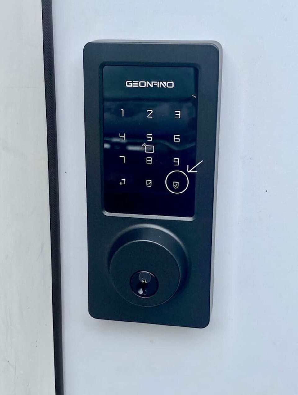 Electronic lock. Enter code then press check mark in lower right hand corner. To lock door from the outside, hold down check mark for 3 seconds.