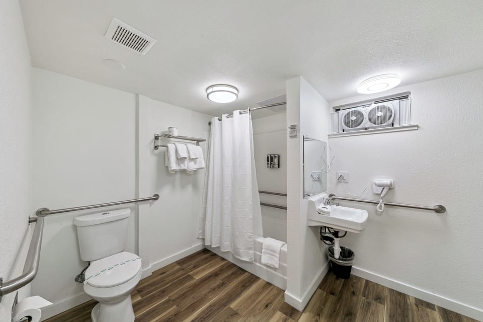 ADA Queen | Bathroom | Shower, eco-friendly toiletries, hair dryer