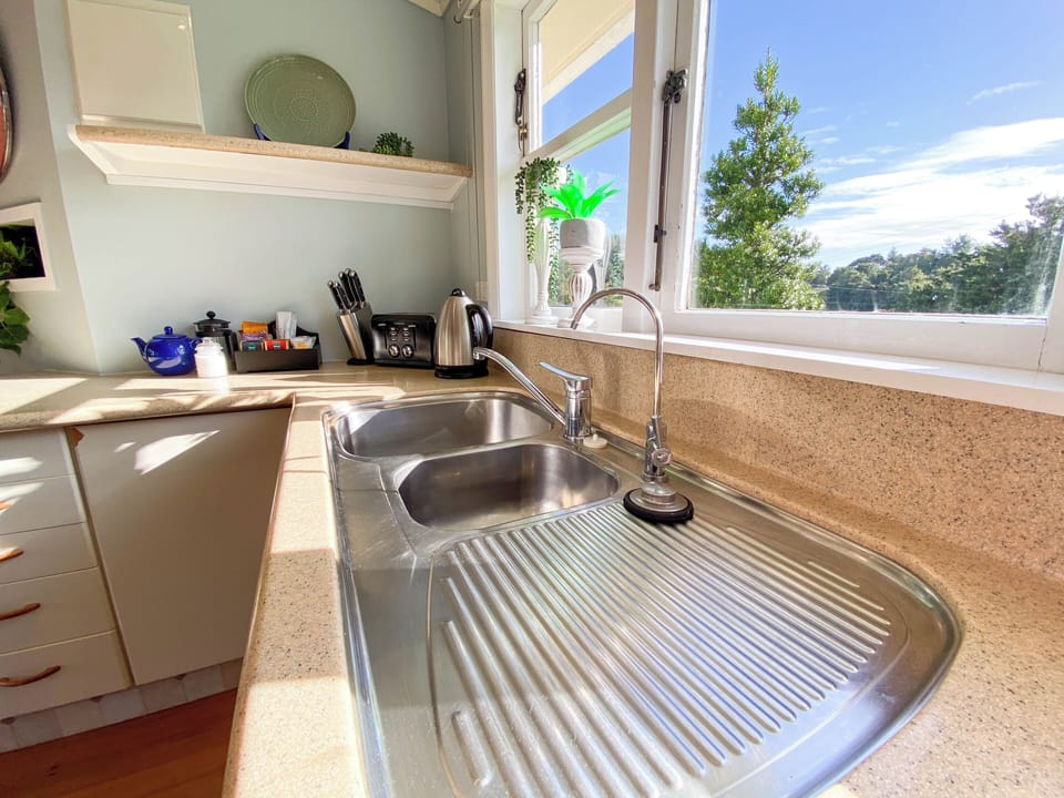 Microwave, electric kettle, toaster, cookware/dishes/utensils