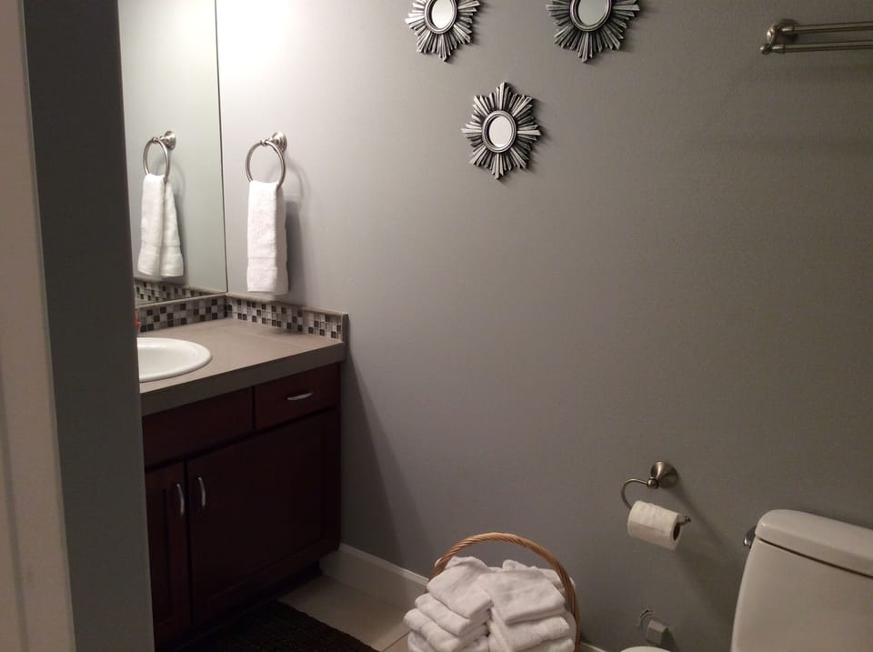 Bathroom with plenty of towels 