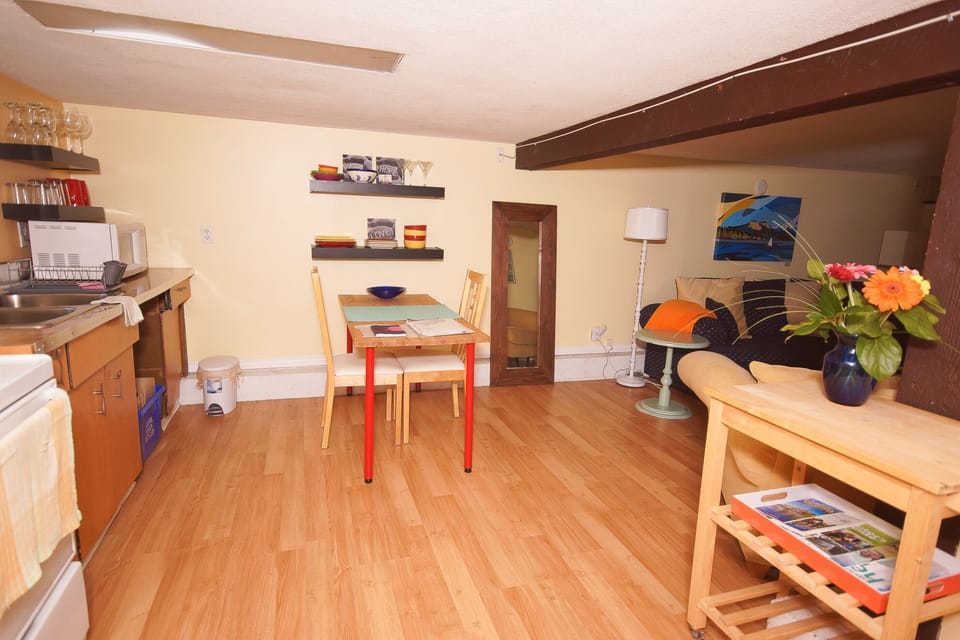 The kitchen and dining room are both stocked very well. 
