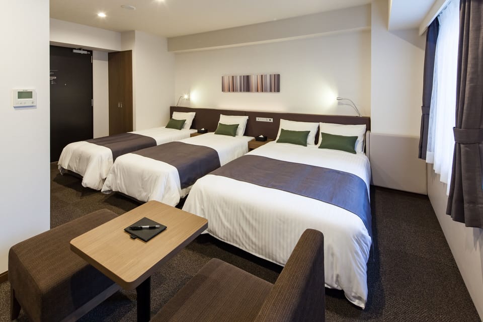 Family Room | Down comforters, desk, WiFi (free), bed sheets