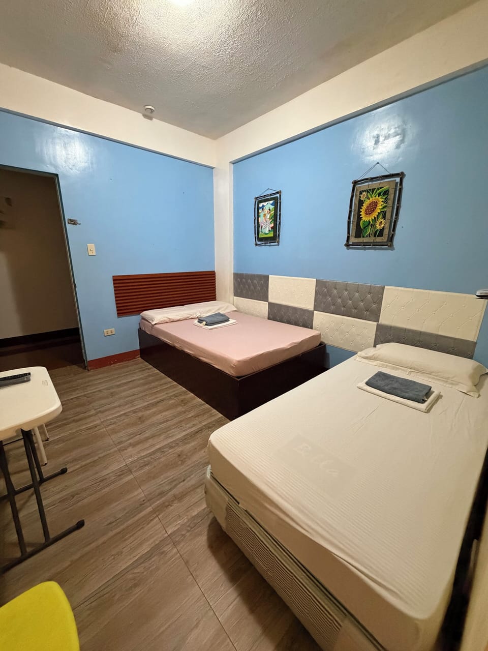 Basic Triple Room, Private Bathroom, Ground Floor | Desk, bed sheets