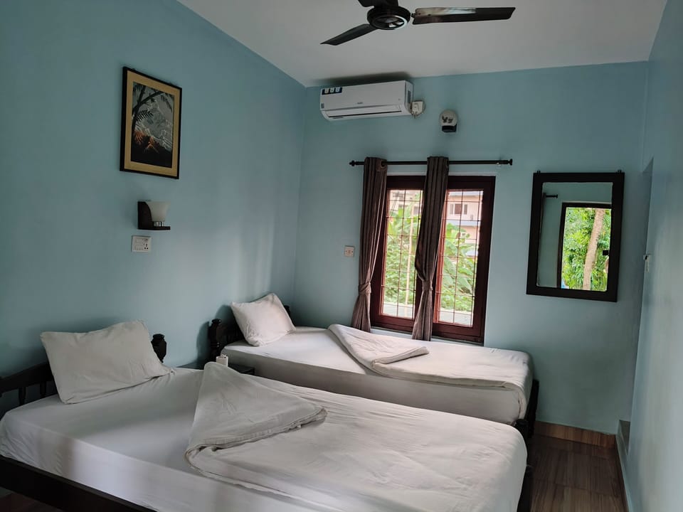 Deluxe Room, Garden View, Garden Area | Desk, laptop workspace, free WiFi, bed sheets