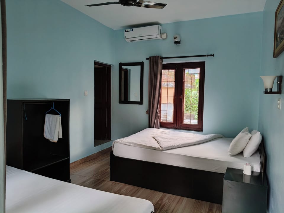 Deluxe Room, Garden View, Garden Area | Desk, laptop workspace, free WiFi, bed sheets