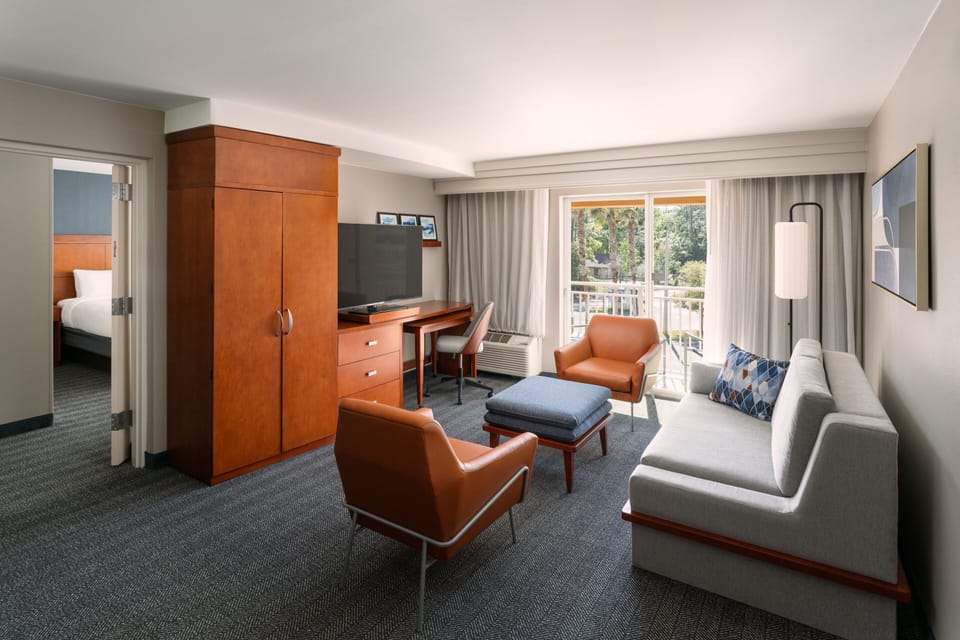 Suite, 1 Bedroom, Balcony | Living area | TV