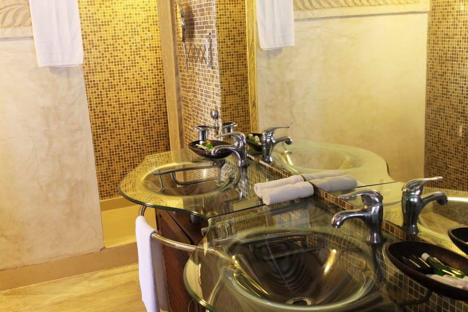 Shower, rainfall showerhead, designer toiletries, hair dryer