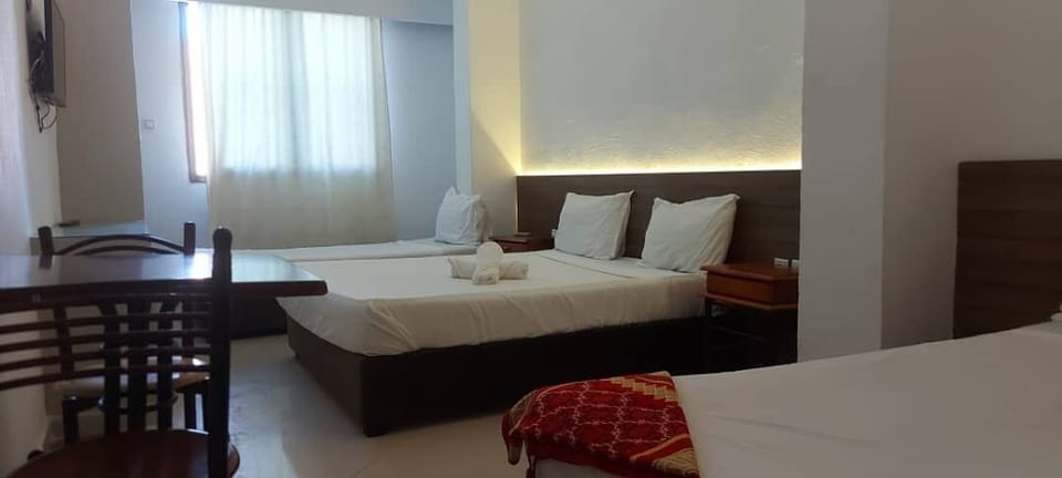 Minibar, desk, blackout drapes, iron/ironing board (on request)