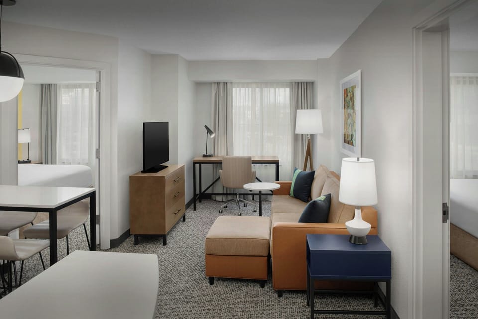 Suite, 2 Bedrooms | Premium bedding, desk, laptop workspace, iron/ironing board