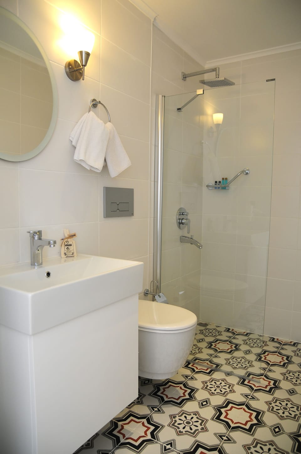 Shower, free toiletries, hair dryer, slippers