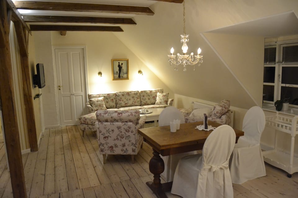 Deluxe Suite, 1 King Bed with Sofa bed, Balcony, Beach View | Living area