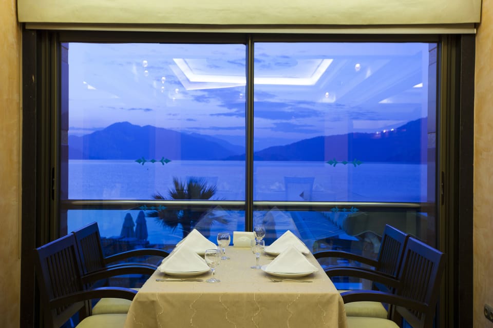 Breakfast, lunch, dinner served; beach views