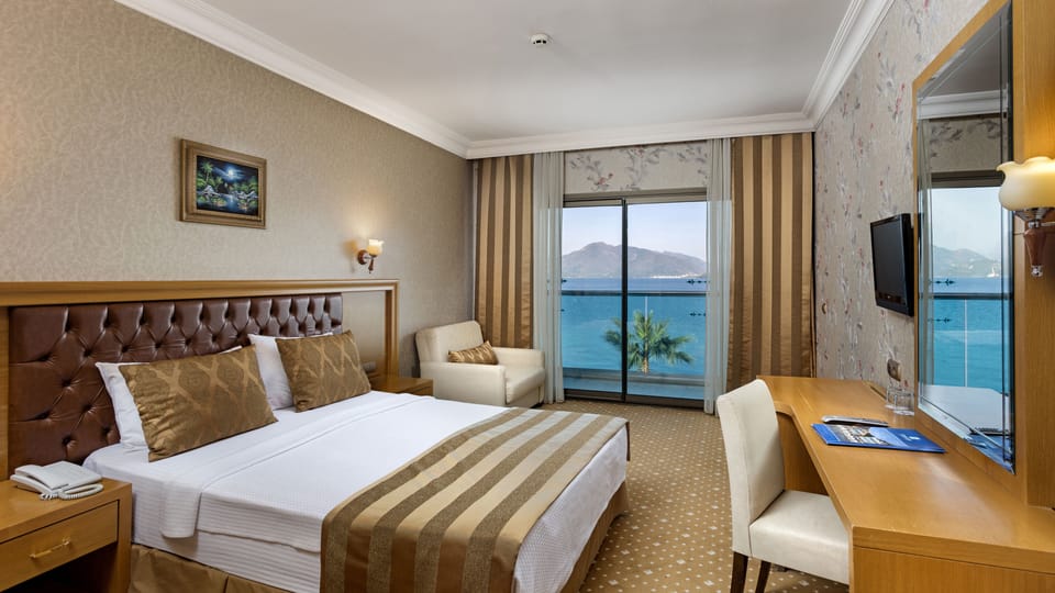 Standard Room, Sea View | Hypo-allergenic bedding, minibar, in-room safe, desk