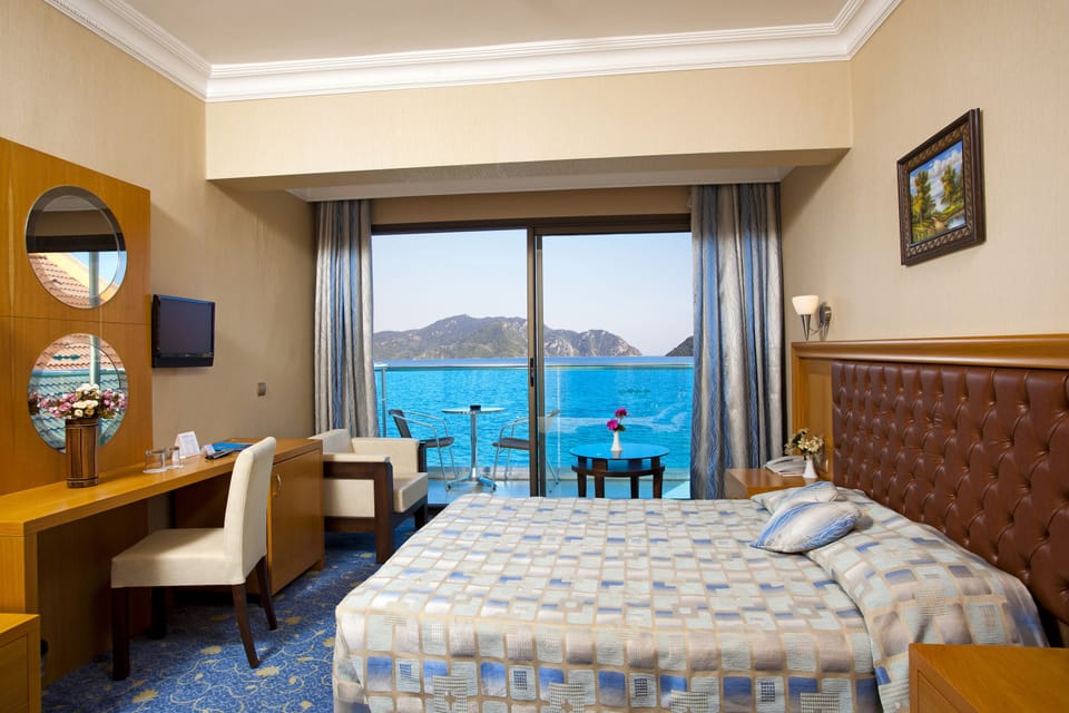 Standard Room, Sea View | Hypo-allergenic bedding, minibar, in-room safe, desk