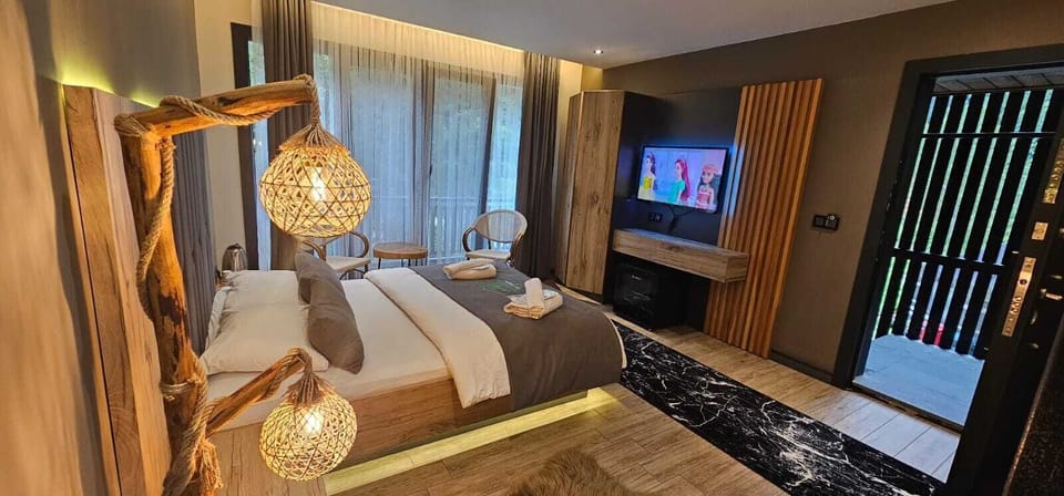 Deluxe Studio, Garden View | Premium bedding, minibar, blackout drapes, soundproofing