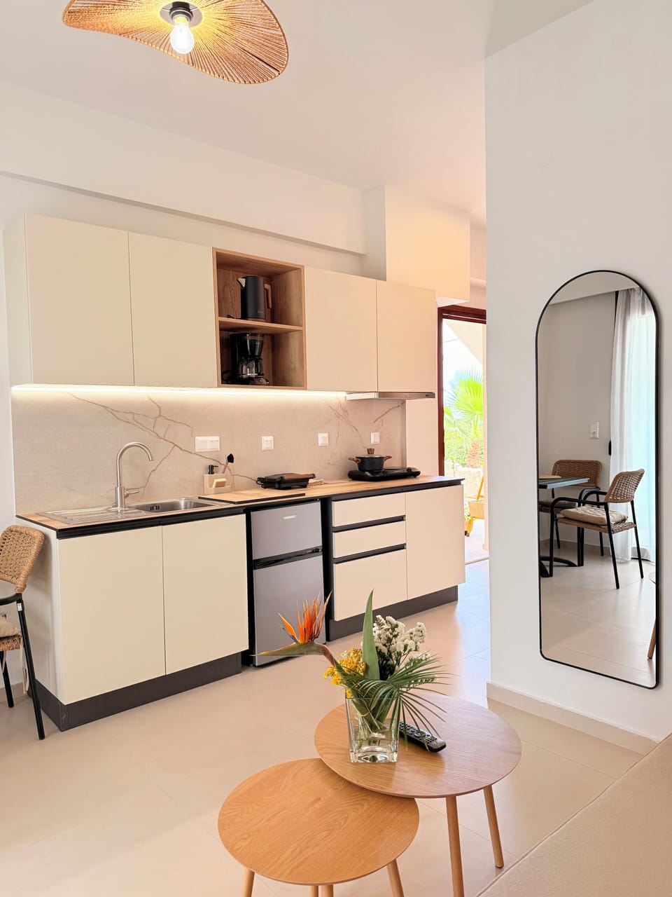 Deluxe Apartment, Partial Sea View | Private kitchen | Fridge, stovetop, electric kettle, highchair