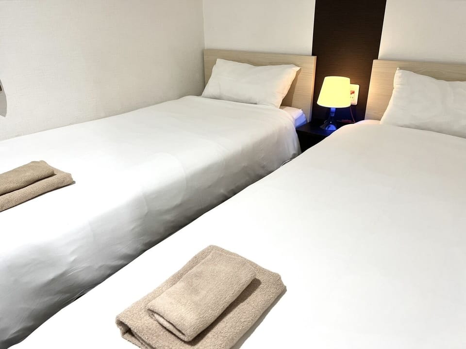 Twin Room, Non Smoking | Iron/ironing board, free WiFi, bed sheets