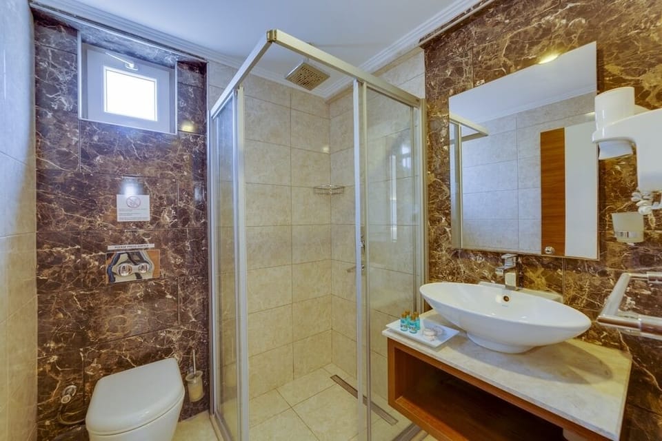 Shower, free toiletries, hair dryer, towels