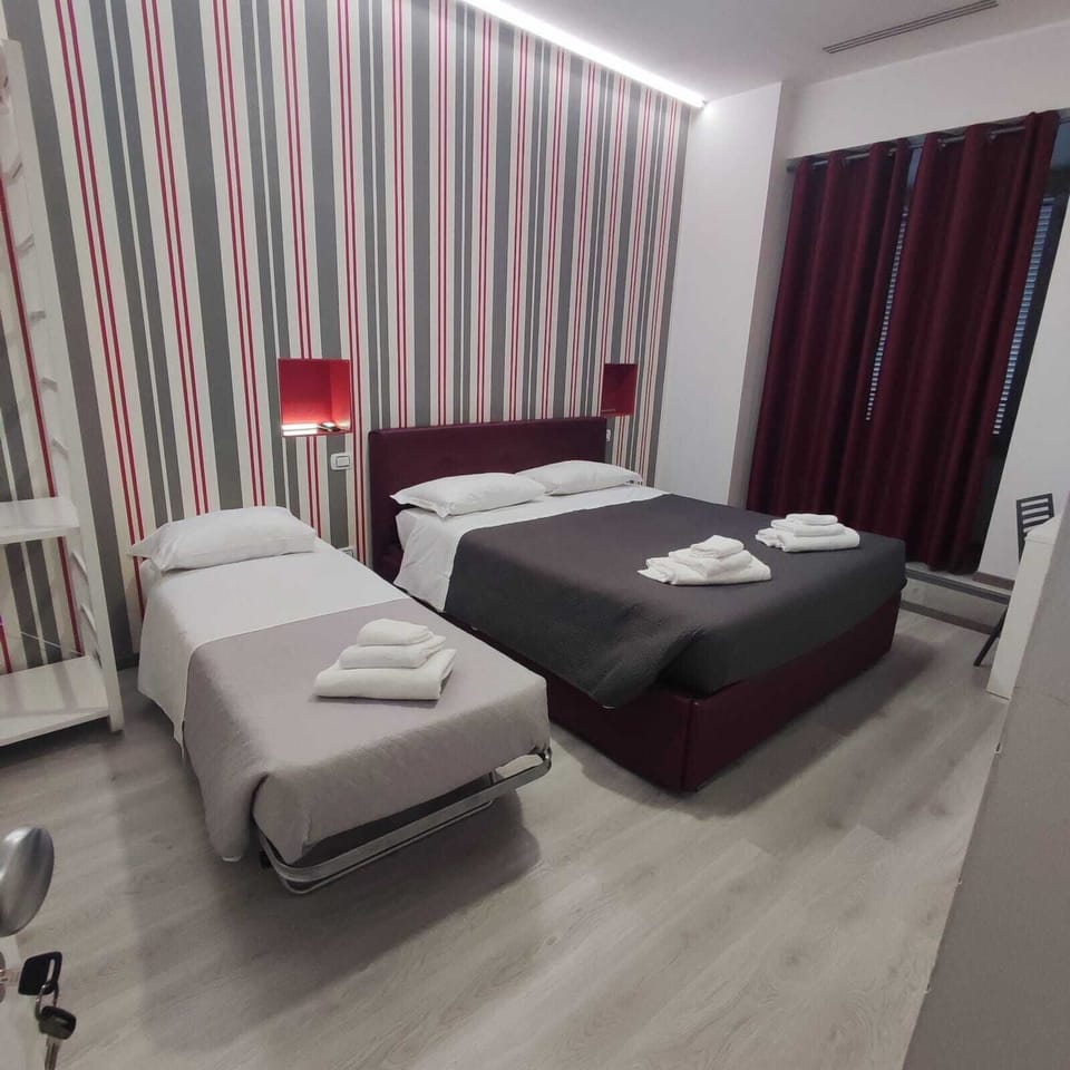 Triple Room | Individually decorated, individually furnished, desk, blackout drapes