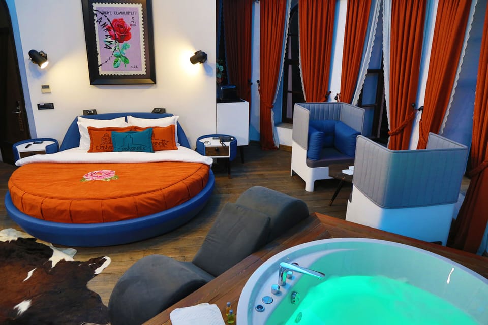 Premium Suite | Minibar, in-room safe, laptop workspace, soundproofing