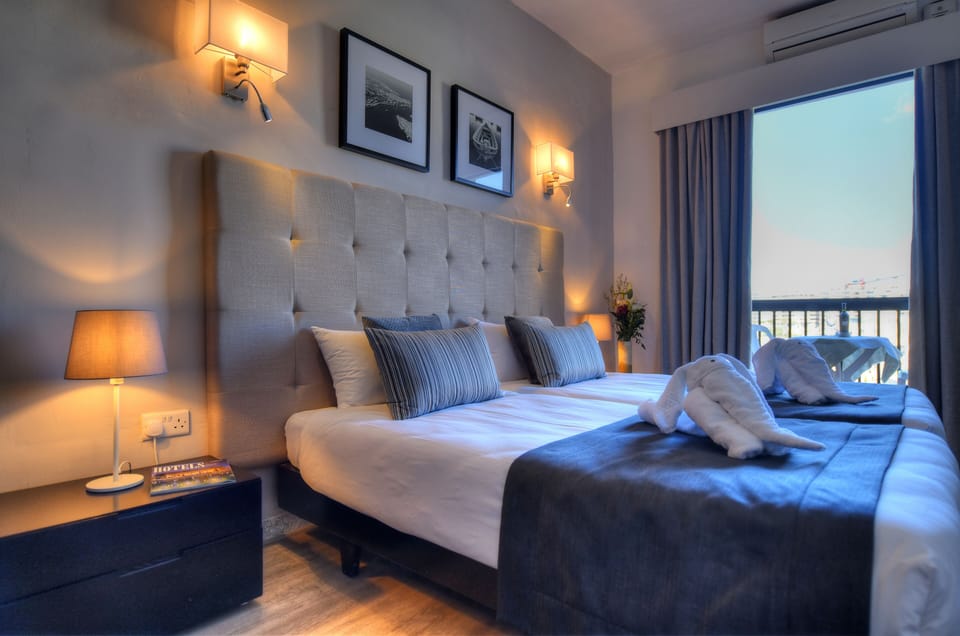 Double or Twin Room, Sea View | In-room safe, desk, blackout drapes, iron/ironing board