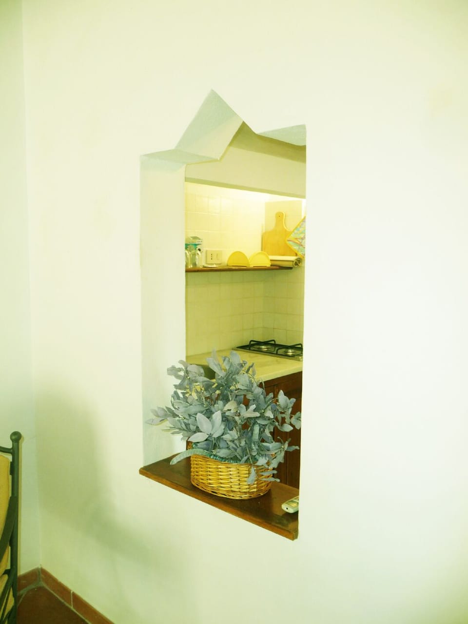 The nice window between the living rooom and the kitchnette