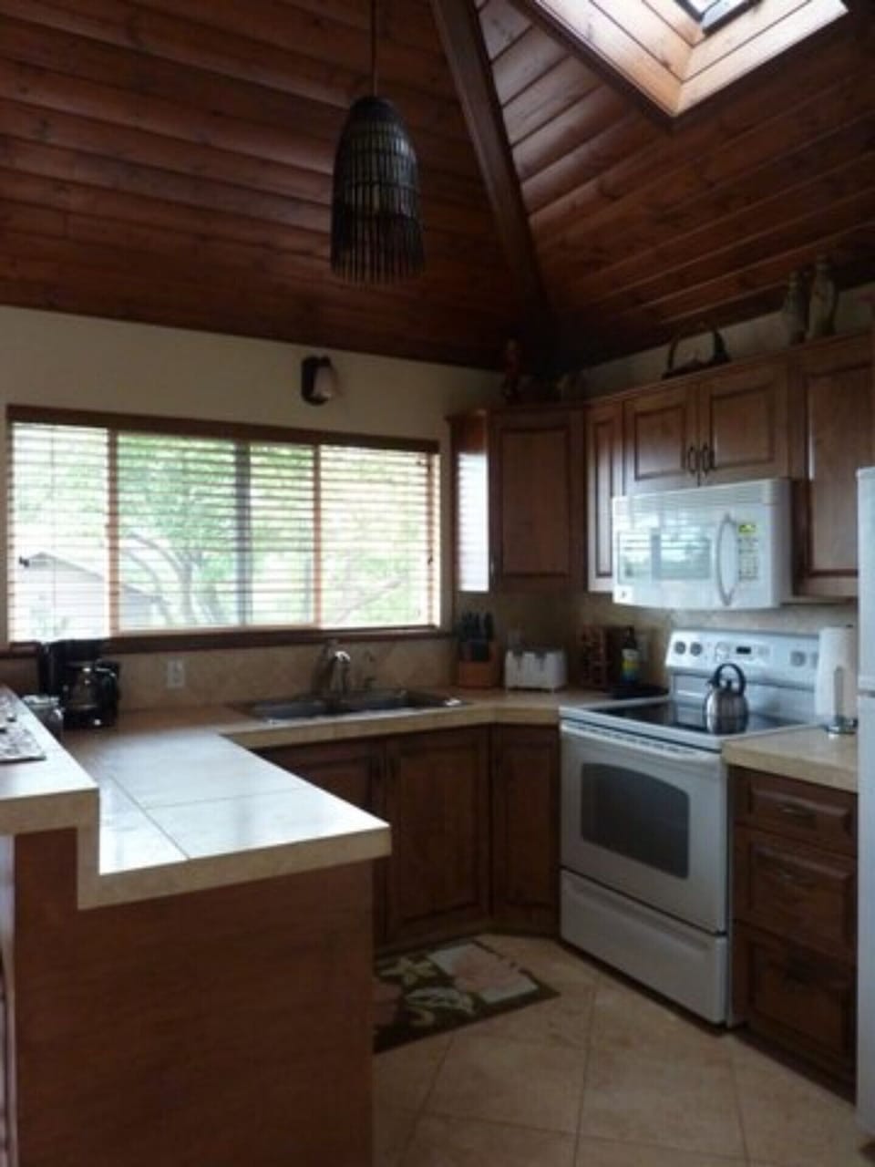 Another view of kitchen.  Includes filtered water at the sink