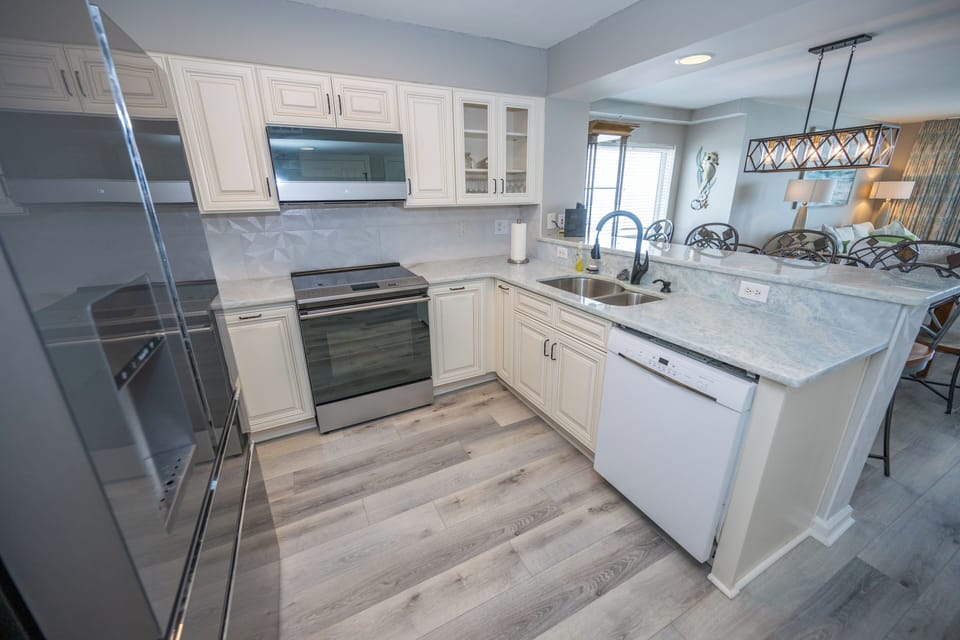 New marble counter tops, new sink with new hardware through out condo